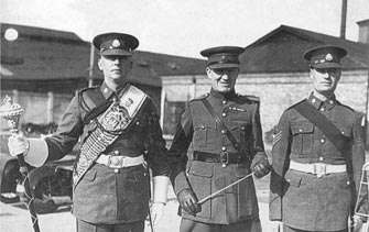 Drum Major E Croot, Bandmaster E Manley, Sergeant Lazard