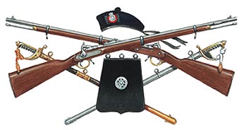 The Other Rank’s Glengarry of the 3rd and 4th Battalions of The East Surreys, 1892. Below is a sabretache of a Field Officer of The 3rd Royal Surrey Militia (RSM). The rifle is a Snider Enfield Short Rifle carried by sergeants of the 2rd RSM. The Company Officer’s sword has a leather scabbard with gilt mounts and the Field Officer’s sword has a steel scabbard and undress sword knot.