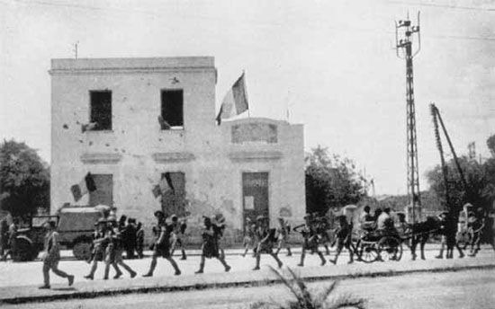 The 1/7th Queen's entering the outskirts of Tunis.