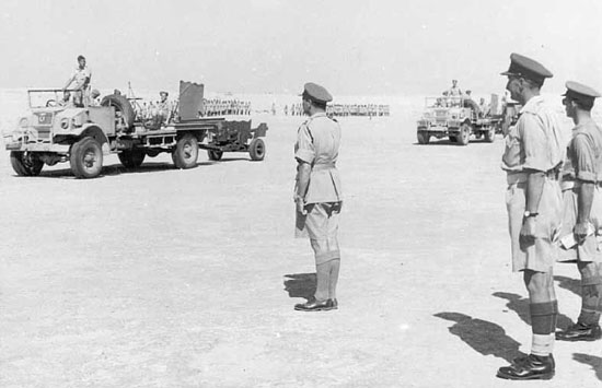 Major-General G. W. E. J. Erskine taking the salute